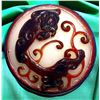 Image 1 : A DIVISION THREE CARVED GLASS BUTTON