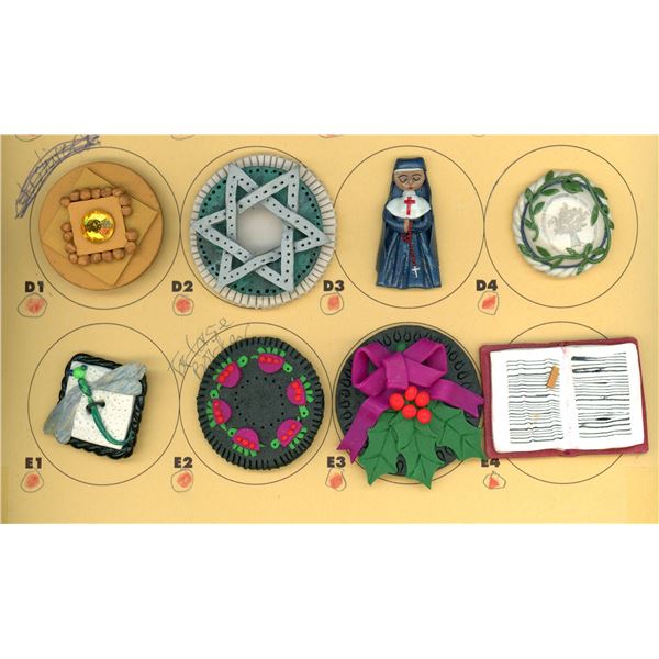 A PARTIAL CARD OF DIVISION THREE STUDIO BUTTONS