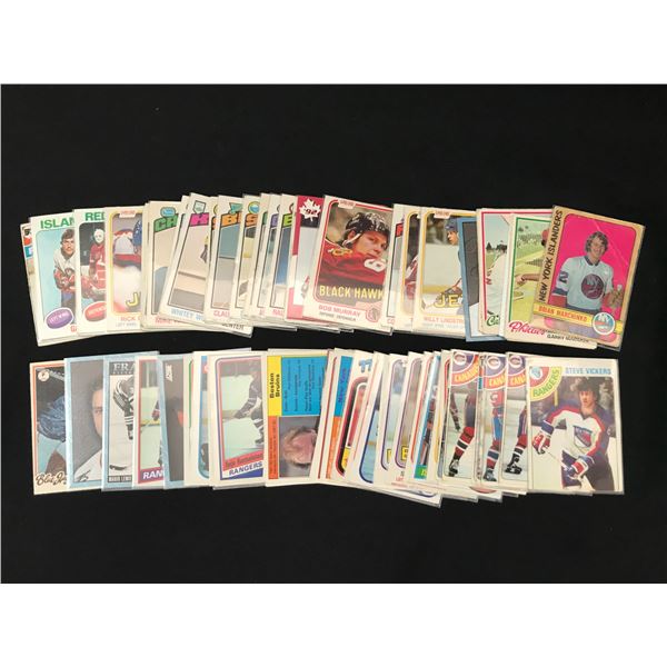 LOT OF HOCKEY TRADING CARDS IN INDIVIDUAL PLASTIC SLEEVES