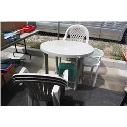 miscellaneous patio furniture, a table, and chairs