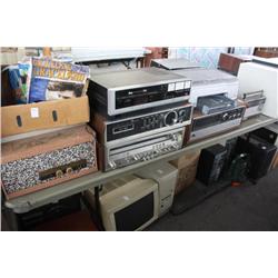 Table lot of miscellaneous household electronics