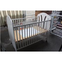Sturdy White Crib with Wheels
