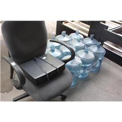 Chair, VCR, and 10 Water Jugs