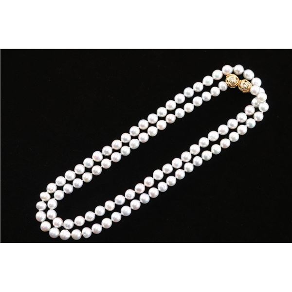 Long Strand of Silver-Pink Pearls.