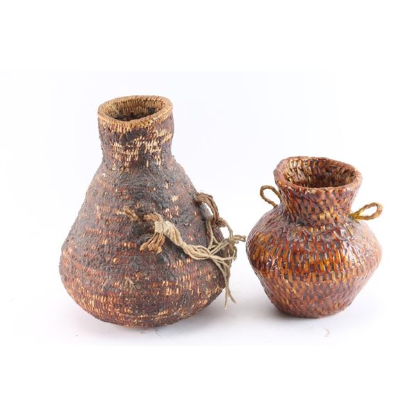 Lot of 2 Apache Pitch-Covered Baskets.