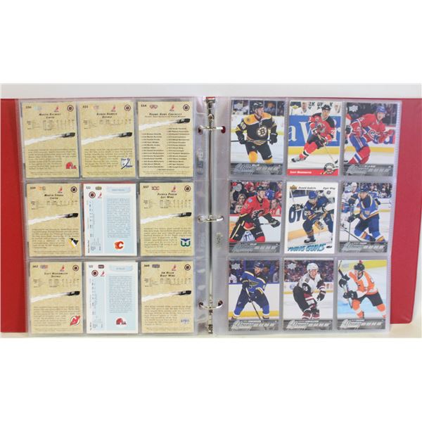 BINDER ALL YOUNG GUNS ROOKIES APPROX 81 CARDS