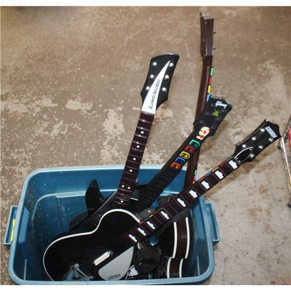 LOT OF 3 ROCK BAND GUITARS + 1 GUITAR HERO