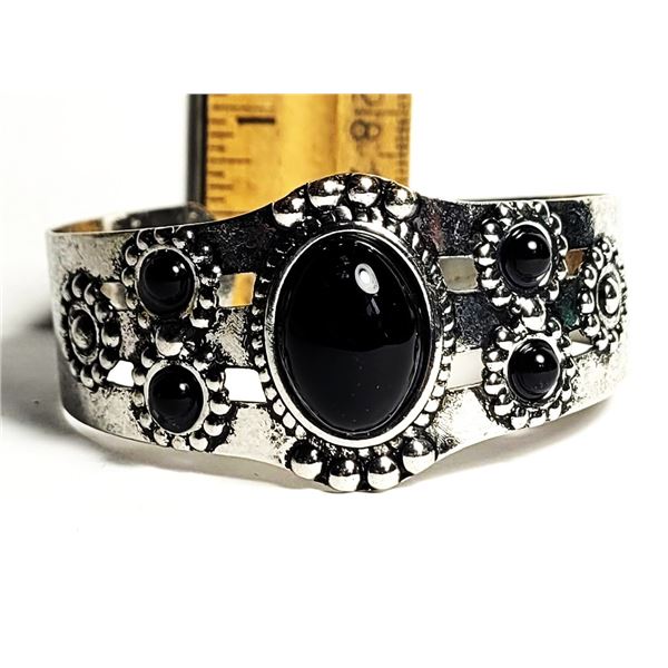 16)  EMBOSSED SILVER TONE OPEN ENDED