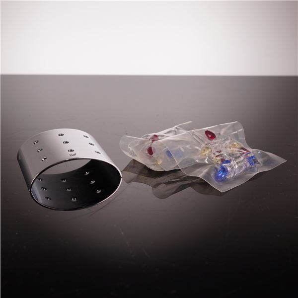 Two Sealed Packs of Swarovski 2002-2004 Renewal Gift Mini Tulips and One Display Stand