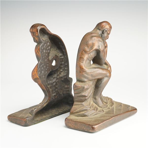 A Pair of Art Deco Cast Metal Bookends Fashioned After Auguste Rodin's The Thinker