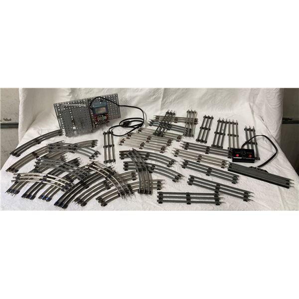 VINTAGE TUBULAR 3-RAIL TRACKS TOY TRAIN TRACKS WITH A POWER TRANSFORMER