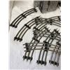 Image 3 : VINTAGE TUBULAR 3-RAIL TRACKS TOY TRAIN TRACKS WITH A POWER TRANSFORMER