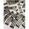 Image 4 : VINTAGE TUBULAR 3-RAIL TRACKS TOY TRAIN TRACKS WITH A POWER TRANSFORMER