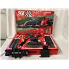 Image 1 : SCX COMPACT 1:43 SCALE SLOT CAR RACING SET, SPECIFICALLY FEATURING FORMULA 1 CARS