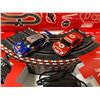 Image 3 : SCX COMPACT 1:43 SCALE SLOT CAR RACING SET, SPECIFICALLY FEATURING FORMULA 1 CARS