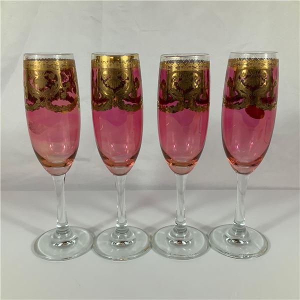 A Set of Four Vintage Italian Pink Glass Champagne Flutes with Gold Gilt Overlay