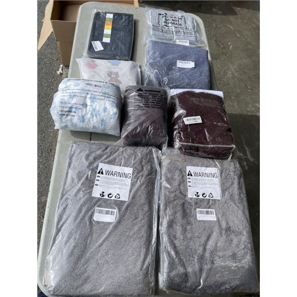 NEW AMAZON OVERSTOCK ITEMS INCULDING BATH RUGS AND IRONING PADS AND SWEAT BANDS FOR SPORTS