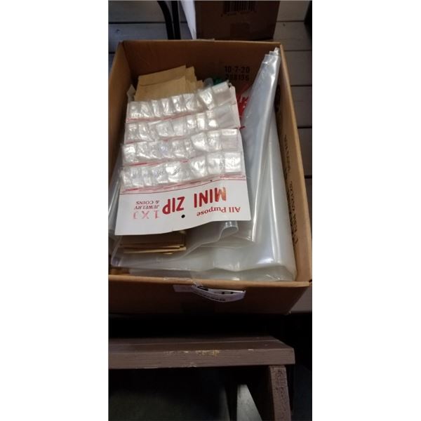 BOX OF POLLY BAGS 20 IN X 13 IN WITH ENVELOPES AND TWIST TIES