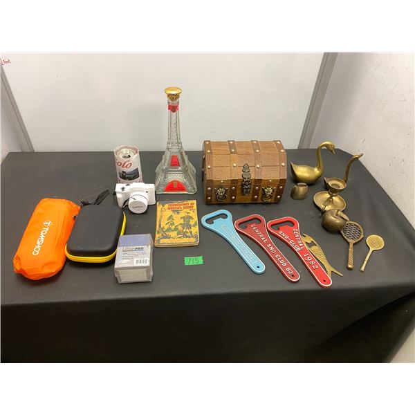 Assorted lot of household items including bottle openers, brass ornaments, Cannon brand digital came