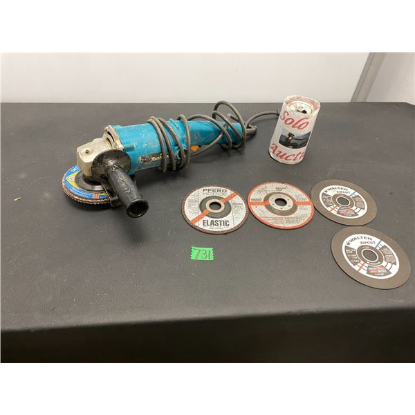 Makita brand side grinder with discs