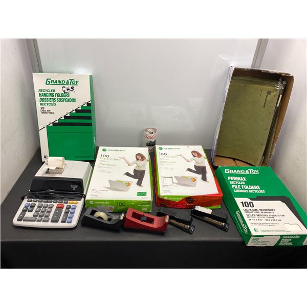 Lot of office supplies including file folders, calculator, tape dispensers, staplers