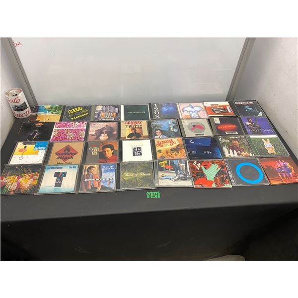 Lot of 32 music CDs featuring various artists