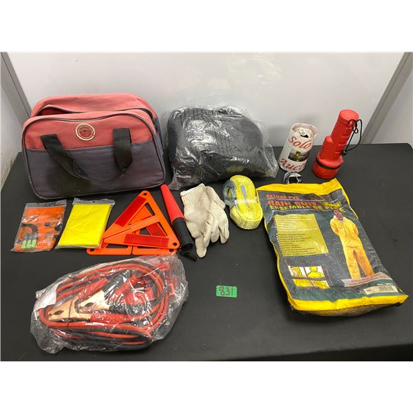 Car safety kit with jumper cables, rain suit, gloves, flashlight and more