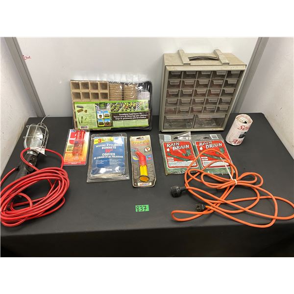 Lot of tool items including trouble light, extension cord, tool case and more