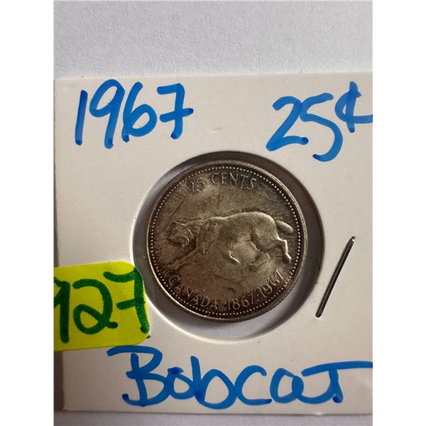 1967 Canadian silver centennial 25 cent coin featuring a Bobcat