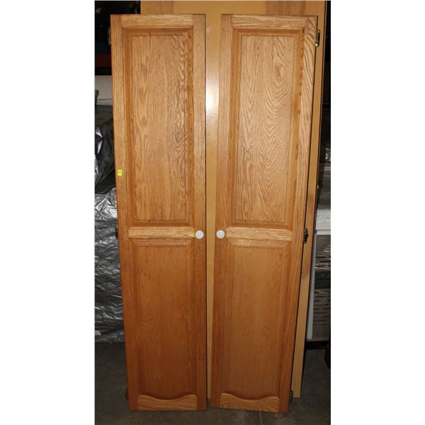 TWO REAL WOOD CABINET DOORS. APPROX 6' TALL X