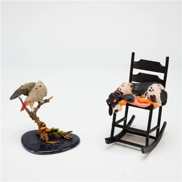 A Pair of Schmid and Tropical Paradise Figurines, Sawin' Logs and African Gray Parrot