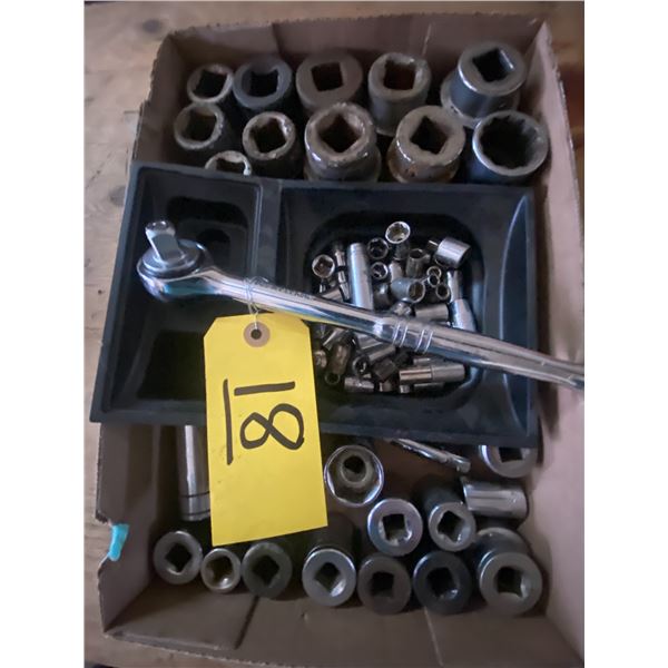 Approx 11 shallow sockets 5/16"- 1 1/2", and misc. shallow, deep sockets, and 3" extensions.