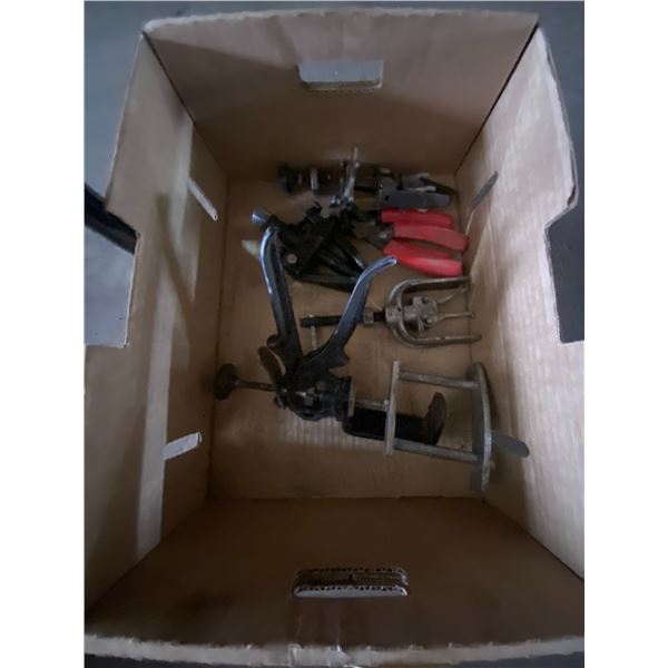 Box of fuel line pliers, windshield pliers, crank shaft pullers etc.