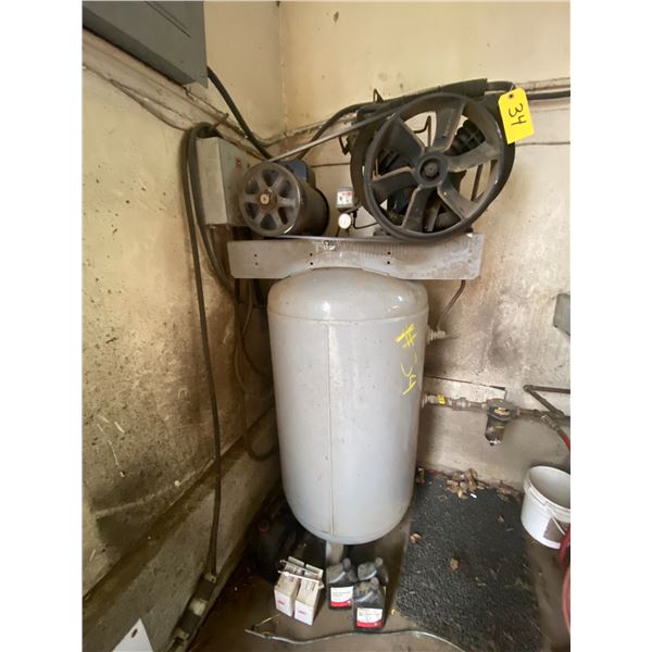 250 gallon upright air compressor. 220V,works good. C/w hose, fittings, oil and filters.