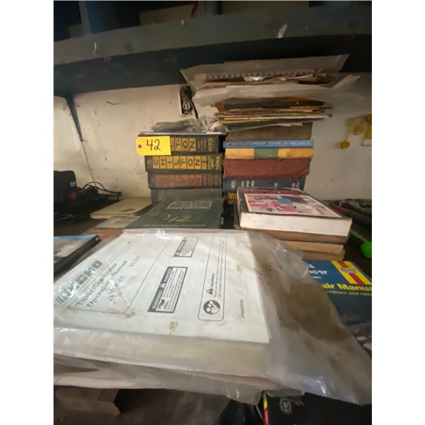 Selection of automative repair manuals, air conditioning repair books, and misc.