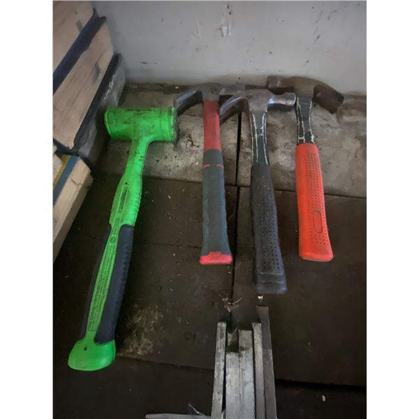 Group of claw hammers, soft head hammers, and keyways.