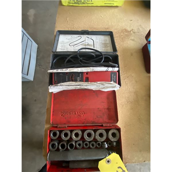 Snap on bushing grinder set and spark plug wire analyser.