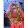Image 4 : Large orange tarp, extension cord, and cut off saw which works.