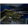 Image 1 : Bag of badminton equipment, and wide load sign.