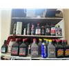 Image 2 : Large quantity of various oils, and everything on the shelf.