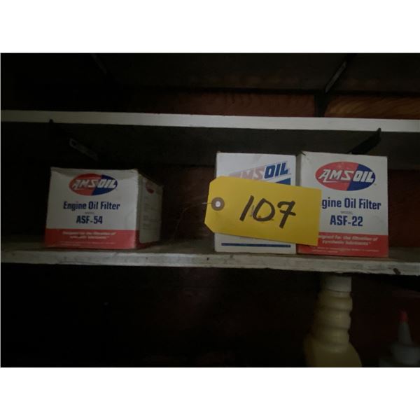 Air filters in boxes (approx. 8), shop supplies, car detailing supplies and contents of cupboard.