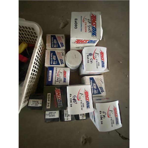 Assortment of oil filters, and box of misc. tools, flares etc.
