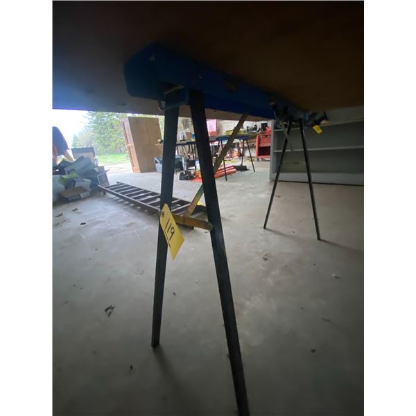 2 metal fold up saw horses.
