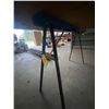 Image 1 : 2 metal fold up saw horses.