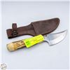 Image 1 : THE BONE COLLECTOR KNIFE & SHEATH. NEVER USED.