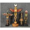 Image 1 : FOUR DECORATIVE TOTEM POLES