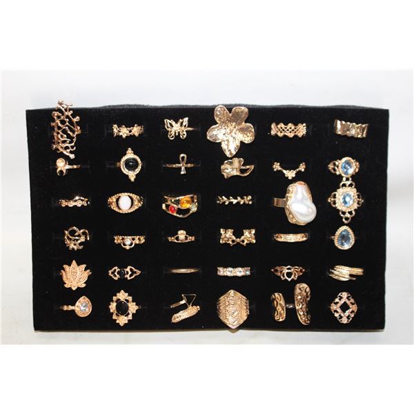 TRAY W/36 GOLDTONE RINGS