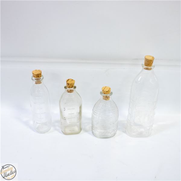 4 ANTIQUE BABY BOTTLES DOG, PHENIX ETC