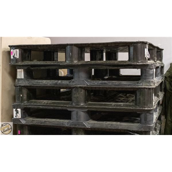 STACK OF 4 HEAVY DUTY PLASTIC PALLETS