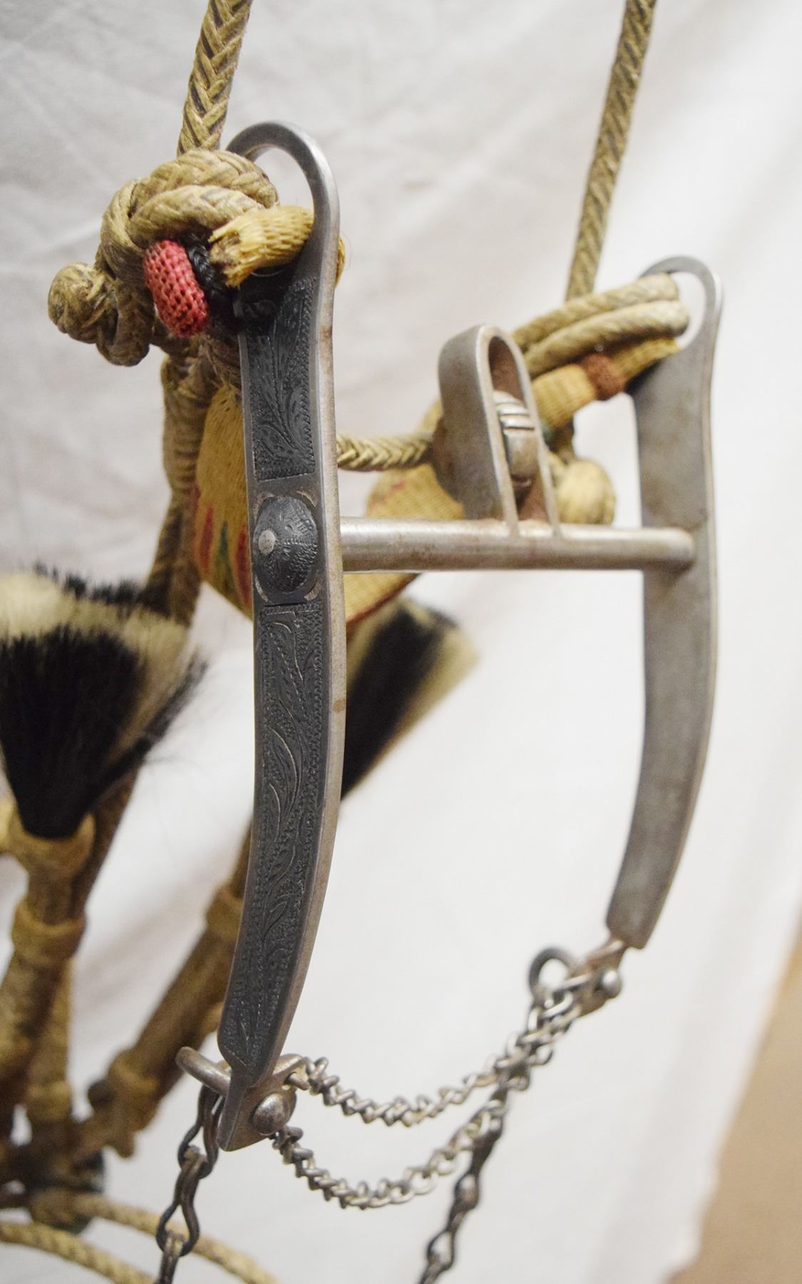 Wyoming State Pennitentary silver inlaid bit w/rawhide braided bridle